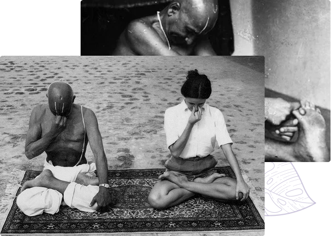Vintage black-and-white photo of a yoga guru teaching alternate nostril breathing to a student, representing the Viniyoga tradition